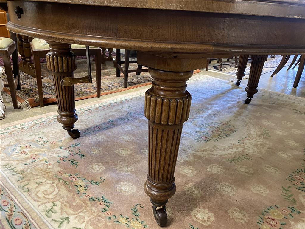 A late Victorian oak extending dining table with two leaves, 270cm extended, width 138cm, height 76cm